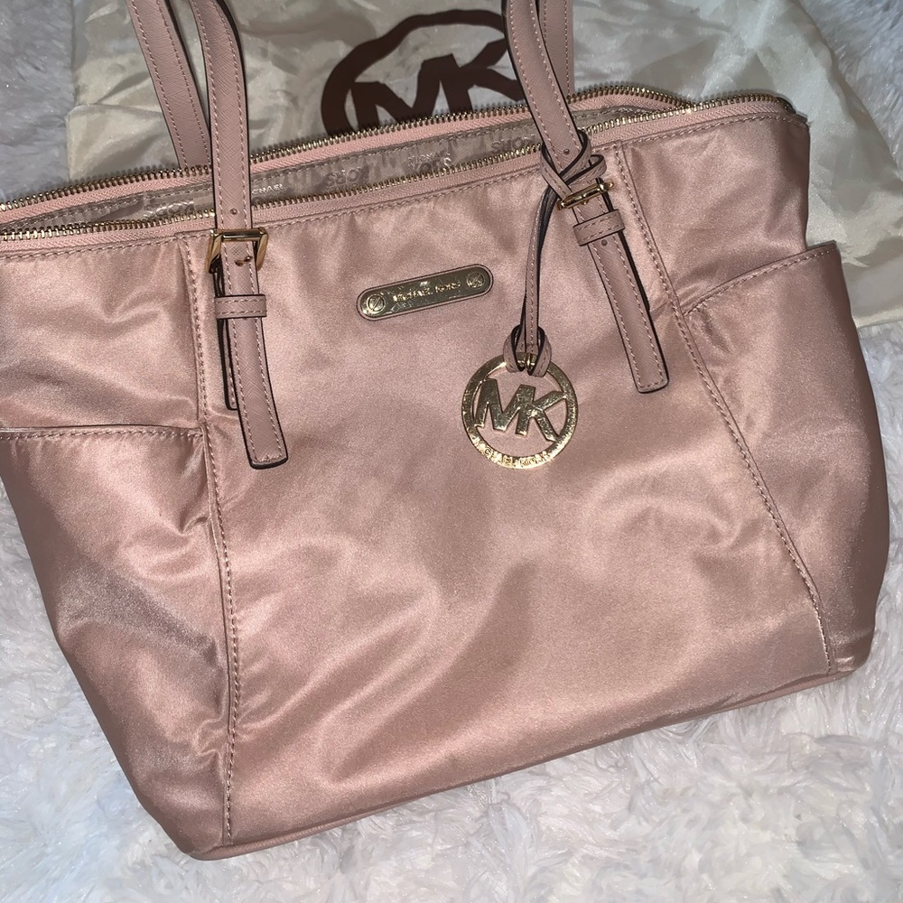 MK rose gold purse